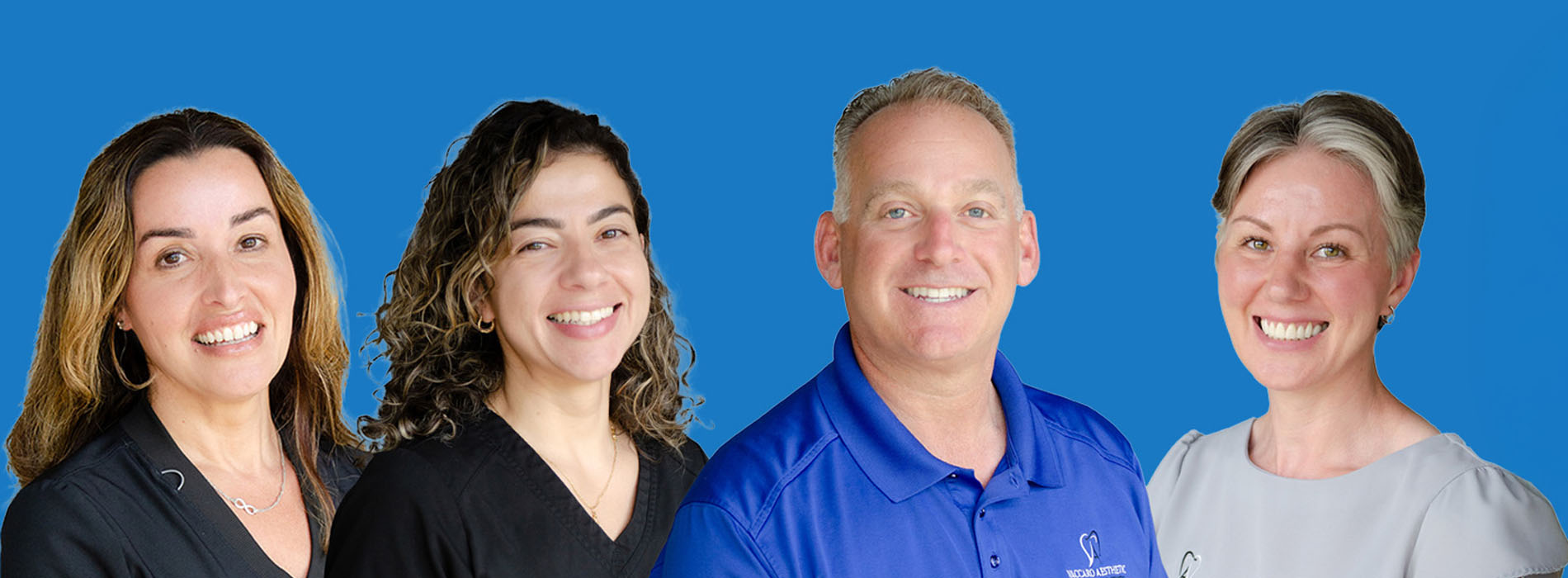 The image shows a group of six individuals posing together for a photograph with smiles on their faces they are standing against a blue background, which suggests they may be associated with a corporate or organizational event.